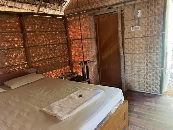 Woven bamboo walls and simple comforts